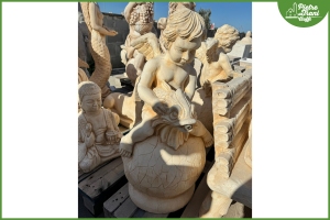 Putto da giardino seduto sul mondo h. 95